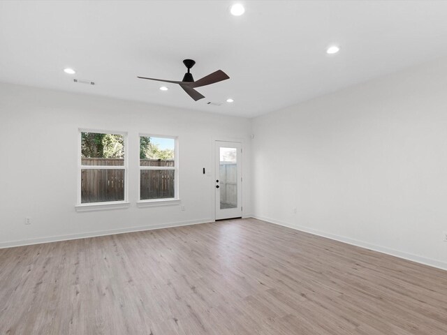 5702 Elysian St, Houston, TX 77009 - empty room with recessed lighting, ceiling fan, and light wood finished floors
