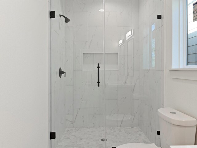 5702 Elysian St, Houston, TX 77009 - full bathroom with a marble finish shower