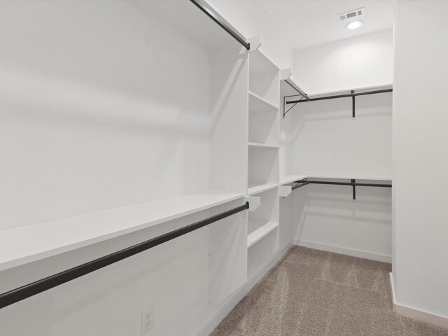 5702 Elysian St, Houston, TX 77009 - spacious closet featuring light colored carpet
