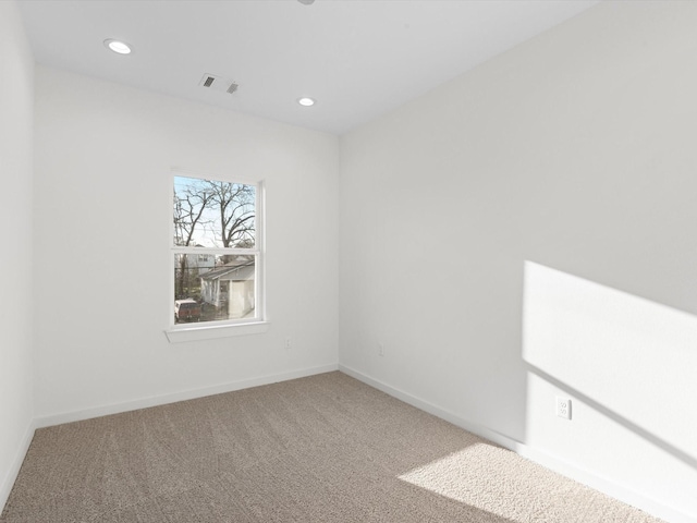 5702 Elysian St, Houston, TX 77009 - unfurnished room featuring carpet floors and recessed lighting