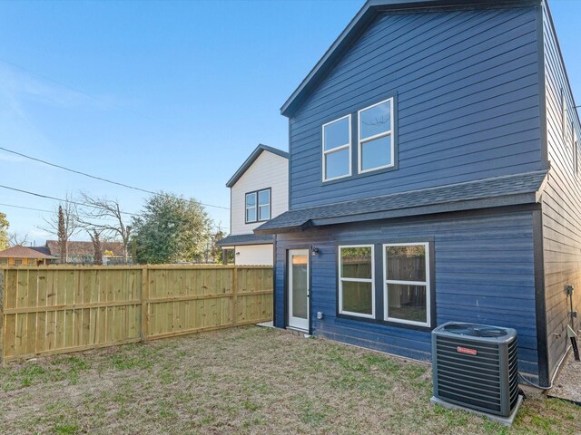 5702 Elysian St, Houston, TX 77009 - rear view of property featuring a shingled roof