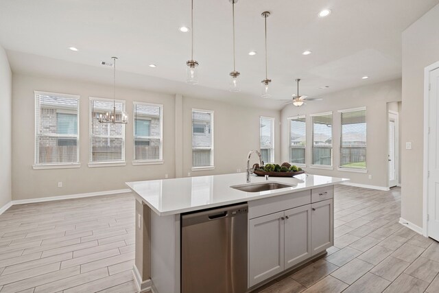 1919 Waters Branch Dr, Missouri City, TX 77459 - kitchen with dishwasher, open floor plan, a ceiling fan, wood tiled floors, and recessed lighting
