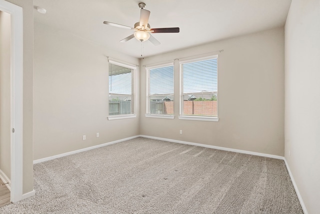 1919 Waters Branch Dr, Missouri City, TX 77459 - empty room with carpet floors, ceiling fan, and a smoke detector