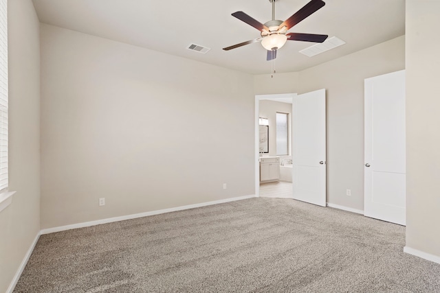 1919 Waters Branch Dr, Missouri City, TX 77459 - unfurnished bedroom featuring carpet flooring, ensuite bath, and a ceiling fan