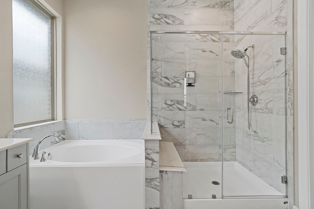 1919 Waters Branch Dr, Missouri City, TX 77459 - full bathroom featuring a bath, a stall shower, and vanity