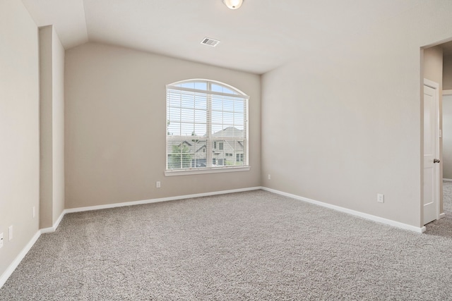 1919 Waters Branch Dr, Missouri City, TX 77459 - carpeted empty room featuring lofted ceiling and baseboards