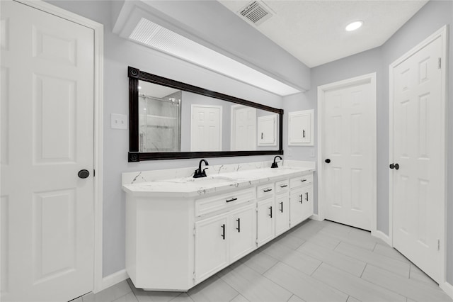 15810 Parksley Dr, Houston, TX 77059 - full bathroom with double vanity and a stall shower