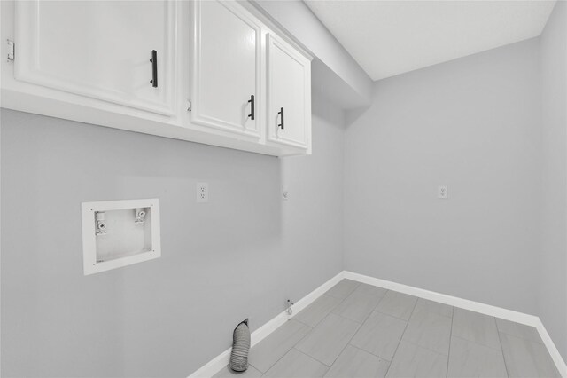 15810 Parksley Dr, Houston, TX 77059 - laundry room with cabinet space, gas dryer hookup, hookup for a washing machine, and electric dryer hookup