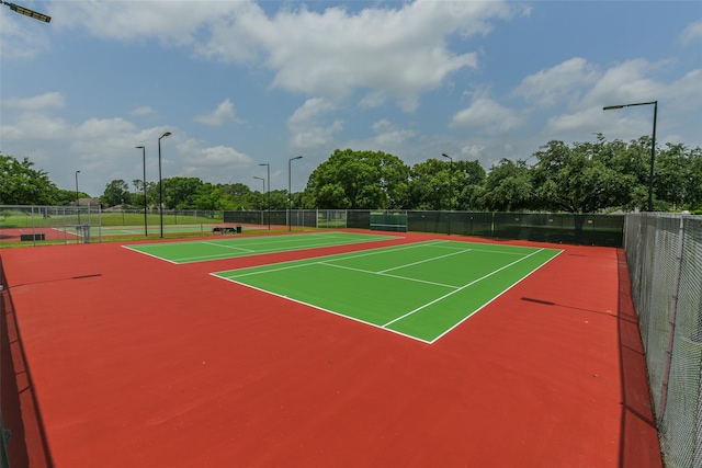 15810 Parksley Dr, Houston, TX 77059 - view of tennis court with community basketball court and view of scattered trees
