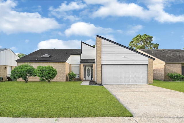 15810 Parksley Dr, Houston, TX 77059 - mid-century modern home with brick siding, concrete driveway, and a front yard