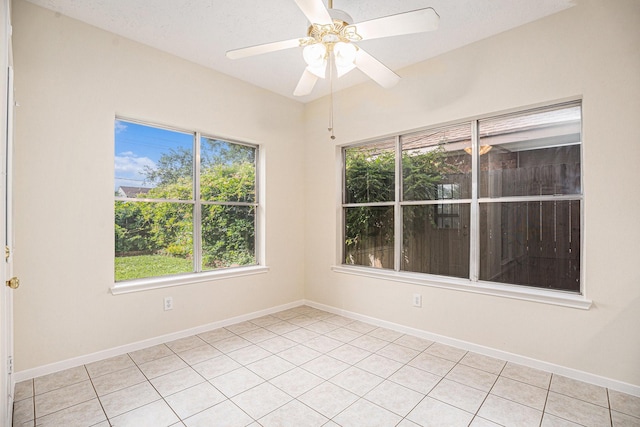 1726 Roaring Springs Ln, Seabrook, TX 77586 - empty room featuring a ceiling fan and light tile patterned flooring