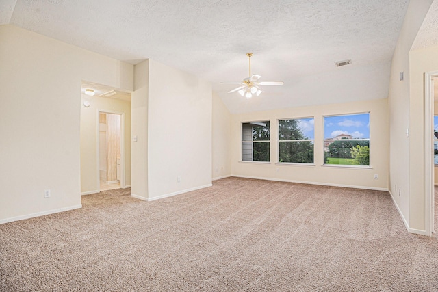 1726 Roaring Springs Ln, Seabrook, TX 77586 - unfurnished room with carpet floors, ceiling fan, vaulted ceiling, and a textured ceiling