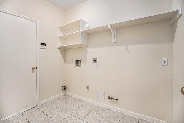 1726 Roaring Springs Ln, Seabrook, TX 77586 - laundry room featuring gas dryer hookup, light tile patterned floors, hookup for a washing machine, and hookup for an electric dryer