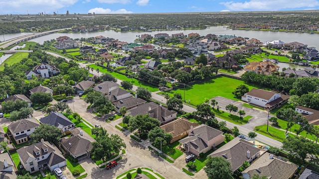 1726 Roaring Springs Ln, Seabrook, TX 77586 - aerial view of residential area featuring a notable bridge and a nearby body of water