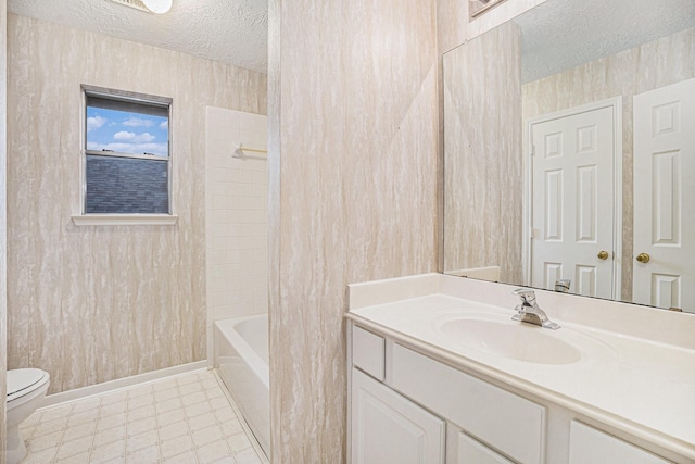 1726 Roaring Springs Ln, Seabrook, TX 77586 - bathroom with a textured ceiling, vanity, tub / shower combination, and tile patterned floors
