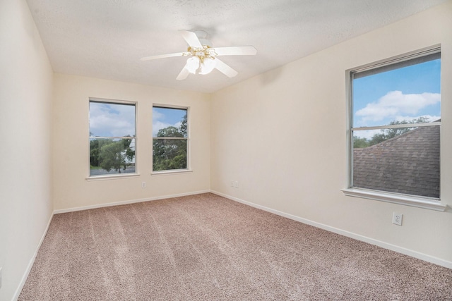 1726 Roaring Springs Ln, Seabrook, TX 77586 - spare room with carpet and ceiling fan