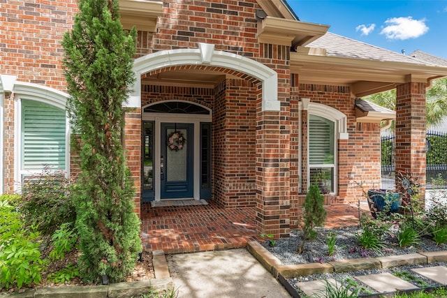 1013 Azalea Pointe, League City, TX 77573 - property entrance featuring brick siding and a shingled roof
