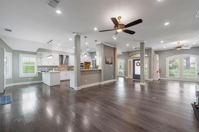 1013 Azalea Pointe, League City, TX 77573 - unfurnished living room with a ceiling fan, plenty of natural light, ornamental molding, dark wood-style flooring, and recessed lighting