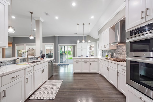 1013 Azalea Pointe, League City, TX 77573 - kitchen with stainless steel appliances, a peninsula, backsplash, ornamental molding, and white cabinets