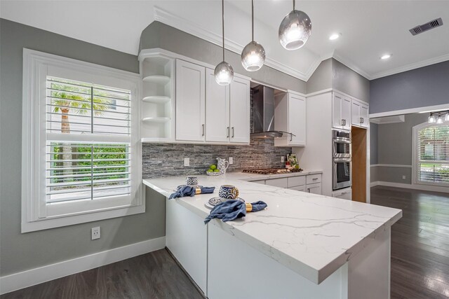 1013 Azalea Pointe, League City, TX 77573 - kitchen featuring wall chimney exhaust hood, backsplash, white cabinets, open shelves, and crown molding