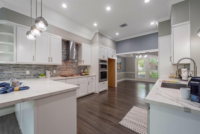 1013 Azalea Pointe, League City, TX 77573 - kitchen featuring wall chimney exhaust hood, crown molding, appliances with stainless steel finishes, light stone counters, and tasteful backsplash
