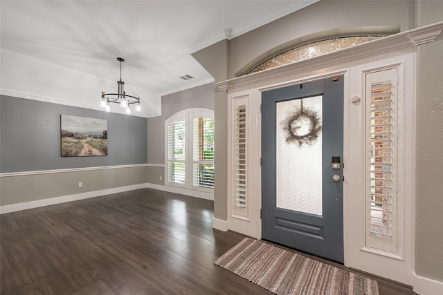 1013 Azalea Pointe, League City, TX 77573 - foyer with a chandelier, crown molding, and dark wood-style floors