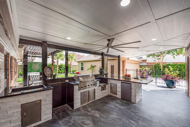 1013 Azalea Pointe, League City, TX 77573 - view of patio with an outdoor kitchen and a ceiling fan