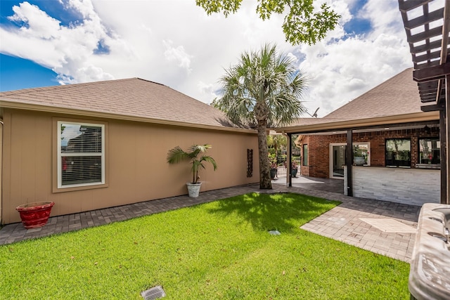 1013 Azalea Pointe, League City, TX 77573 - view of green lawn with a patio area