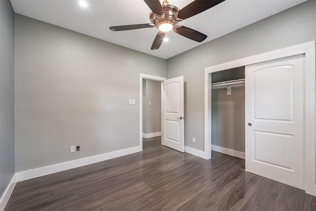 1013 Azalea Pointe, League City, TX 77573 - unfurnished bedroom with dark wood-type flooring, a closet, and a ceiling fan