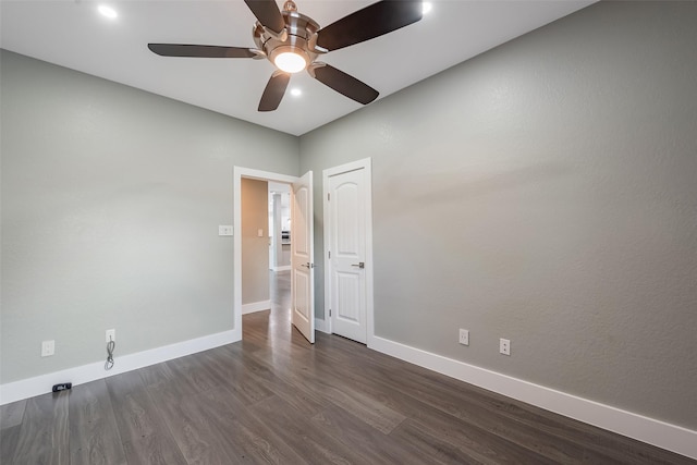 1013 Azalea Pointe, League City, TX 77573 - unfurnished room with dark wood-style floors and a ceiling fan