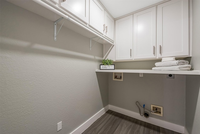 1013 Azalea Pointe, League City, TX 77573 - washroom with hookup for an electric dryer, hookup for a washing machine, dark wood-style floors, and cabinet space