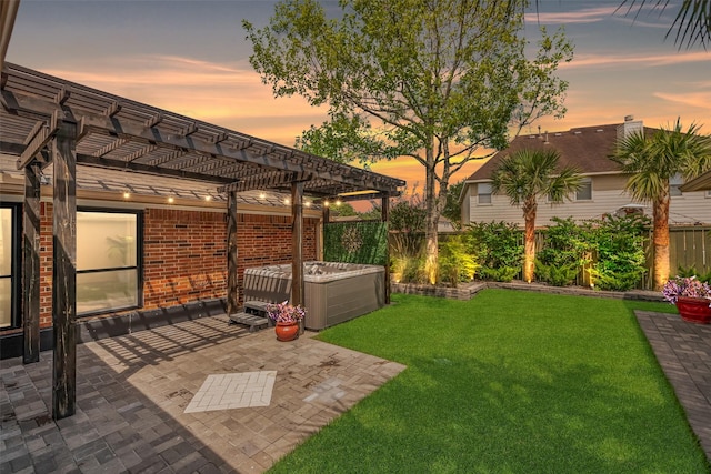 1013 Azalea Pointe, League City, TX 77573 - yard at dusk with a pergola, a patio, and a fenced backyard