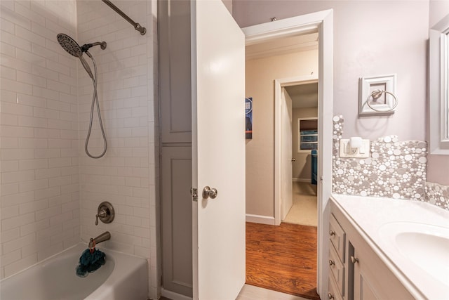 1208 15th Ave N, Texas City, TX 77590 - bathroom with vanity, tub / shower combination, and wood finished floors