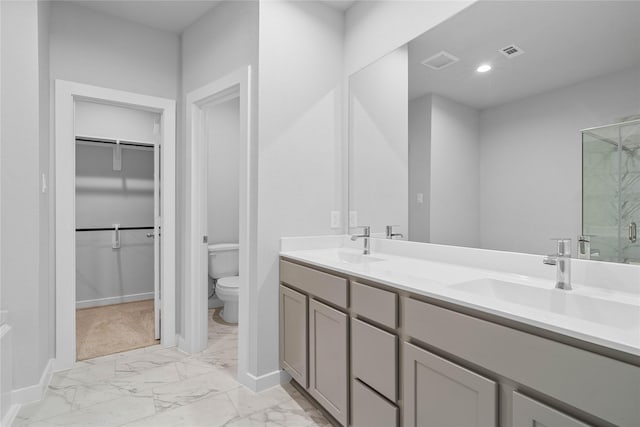 6702 Old Cypress Landing Ln, Humble, TX 77338 - full bathroom with marble look tile flooring, a walk in closet, double vanity, and a shower stall