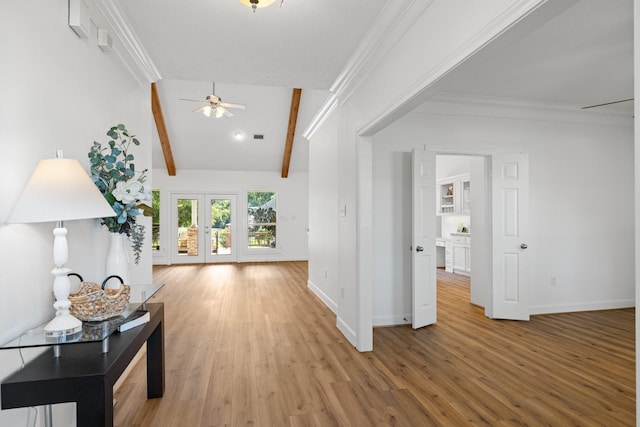 34310 High Point Dr, Magnolia, TX 77355 - hallway featuring french doors, wood finished floors, and crown molding