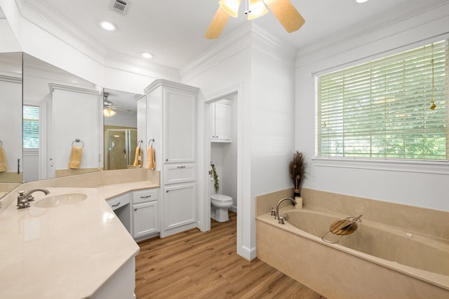 34310 High Point Dr, Magnolia, TX 77355 - bathroom featuring ceiling fan, vanity, ornamental molding, a bath, and wood finished floors
