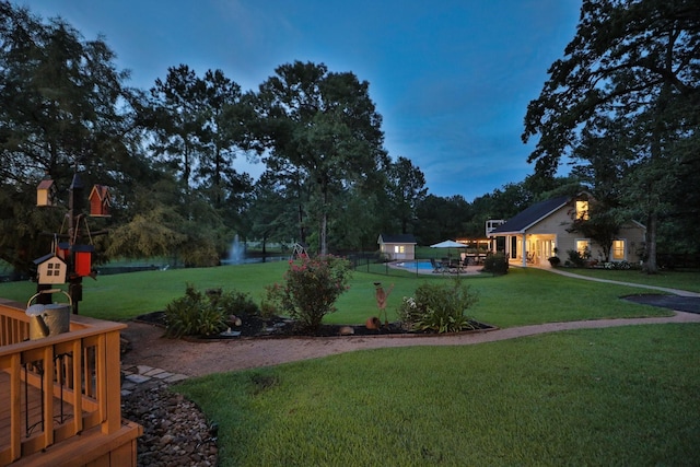 34310 High Point Dr, Magnolia, TX 77355 - view of green lawn featuring an outbuilding