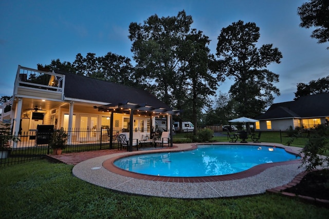 34310 High Point Dr, Magnolia, TX 77355 - view of swimming pool featuring french doors and a patio area