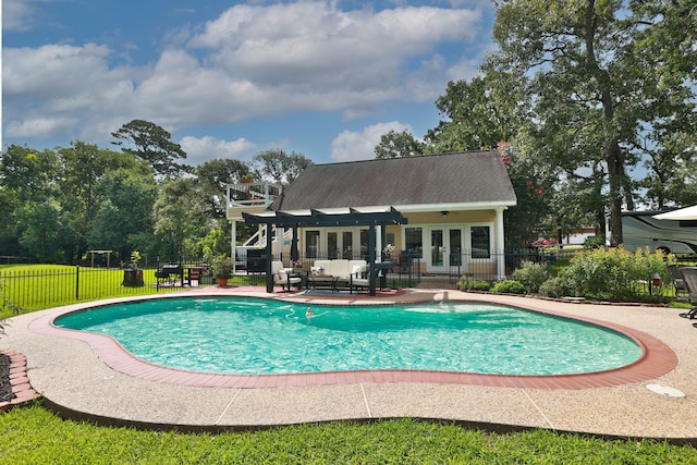 34310 High Point Dr, Magnolia, TX 77355 - view of swimming pool with french doors and a patio
