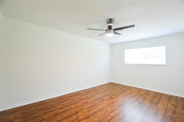 154 Wood Manor Ln, Sour Lake, TX 77659 - spare room featuring wood finished floors, ceiling fan, ornamental molding, and a textured ceiling
