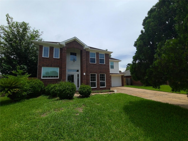 6322 Northland Dr, Houston, TX 77084 - traditional home with brick siding, a front lawn, and driveway