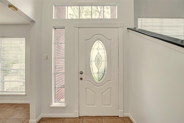 6322 Northland Dr, Houston, TX 77084 - foyer featuring light tile patterned floors and plenty of natural light