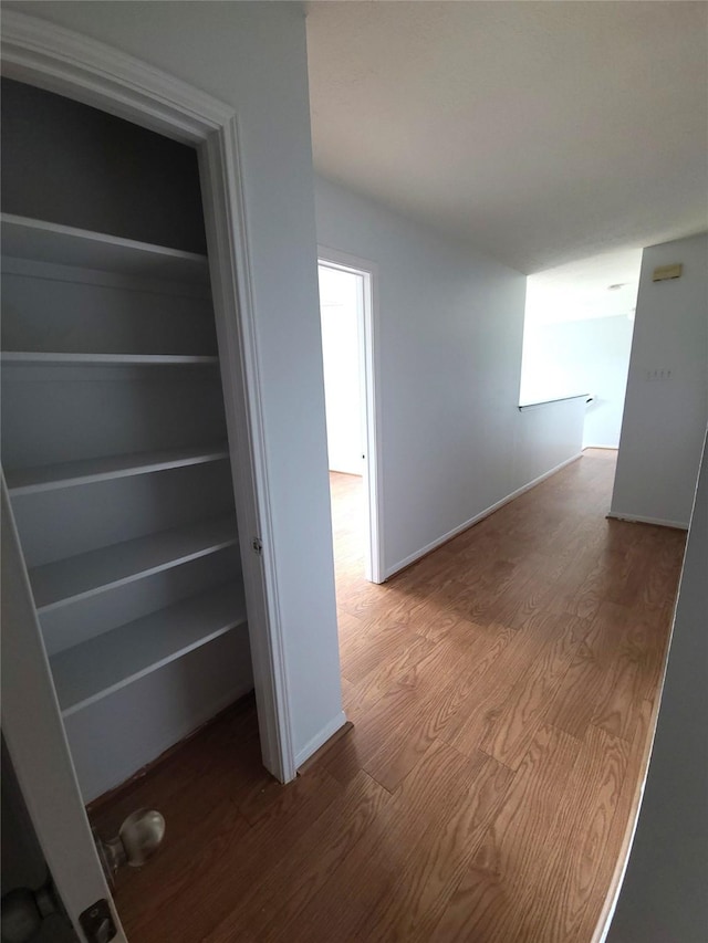 6322 Northland Dr, Houston, TX 77084 - corridor featuring wood finished floors and baseboards