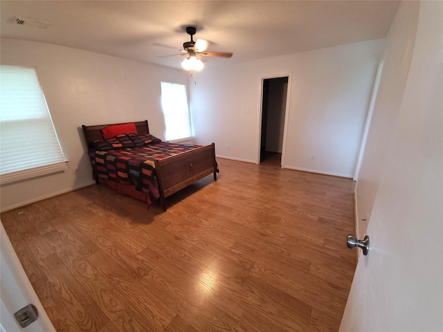 6322 Northland Dr, Houston, TX 77084 - bedroom featuring wood finished floors and a ceiling fan