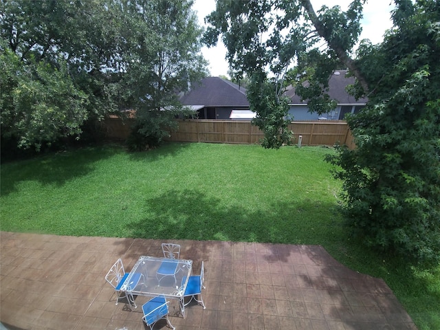 6322 Northland Dr, Houston, TX 77084 - fenced backyard featuring a patio area and outdoor dining space
