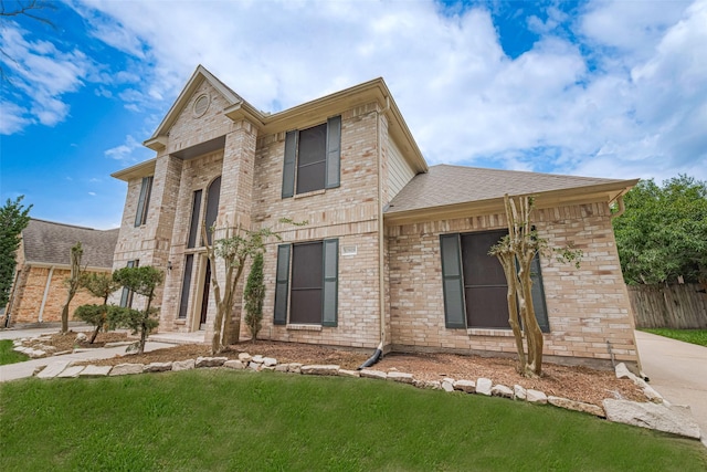 10818 Kleberg Place Dr, Houston, TX 77064 - view of front facade featuring brick siding and a shingled roof