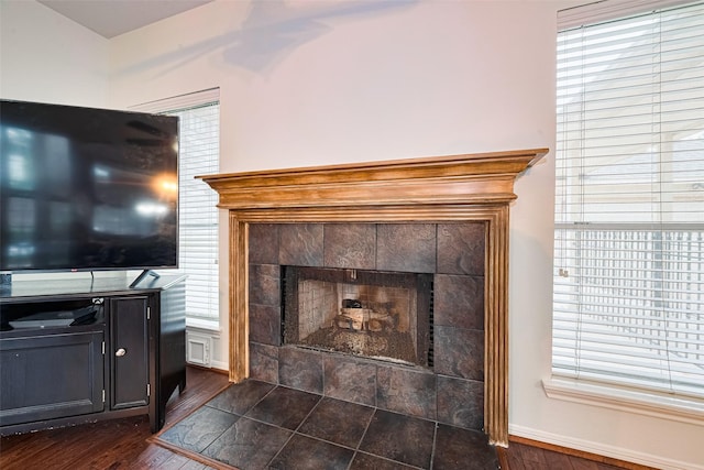 10818 Kleberg Place Dr, Houston, TX 77064 - detailed view of wood finished floors and a tile fireplace