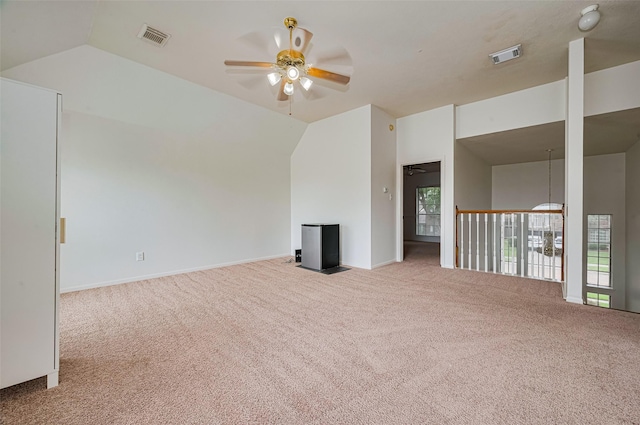 10818 Kleberg Place Dr, Houston, TX 77064 - unfurnished living room with a ceiling fan, carpet, and lofted ceiling