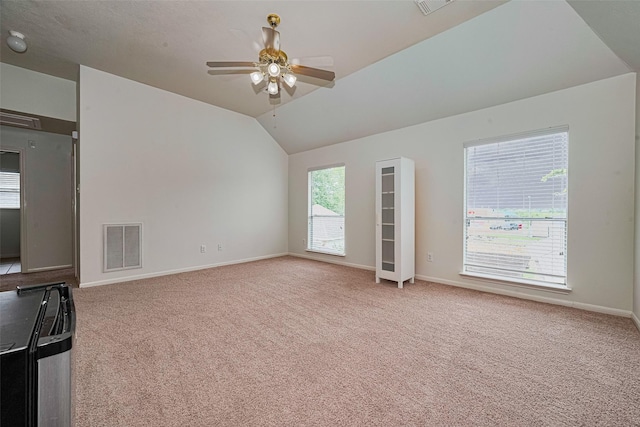 10818 Kleberg Place Dr, Houston, TX 77064 - unfurnished living room with carpet, a ceiling fan, and vaulted ceiling