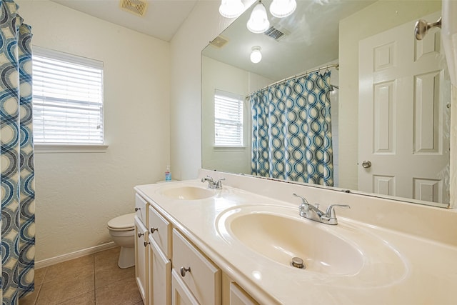 10818 Kleberg Place Dr, Houston, TX 77064 - bathroom with double vanity, tile patterned floors, and a shower with shower curtain